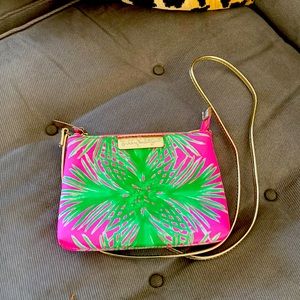 LILLY cross body mini bag mint condition. Pink and green water resistant fabric